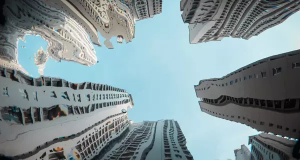 Häuser gespiegelt im Wasser. Symbolbild Wohnungsbau. Foto: ariel sion / Unsplash.com